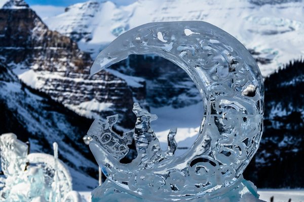 Quelle location à Québec offre des ateliers de sculpture sur glace en hiver?
